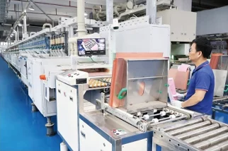 Fully automatic horizontal copper sinking and adhesive removal line
